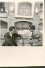 Juan Guerrero Zamora y Miguel Abad Miró ante la tumba de Miguel Hernández